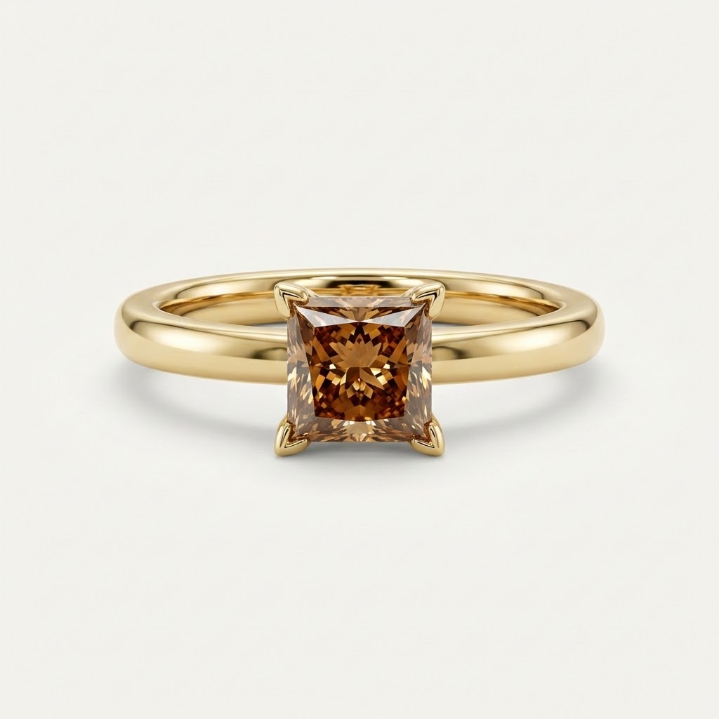 Gold ring with a square-cut brown gemstone on a light gray background::Princess|Yellow Gold