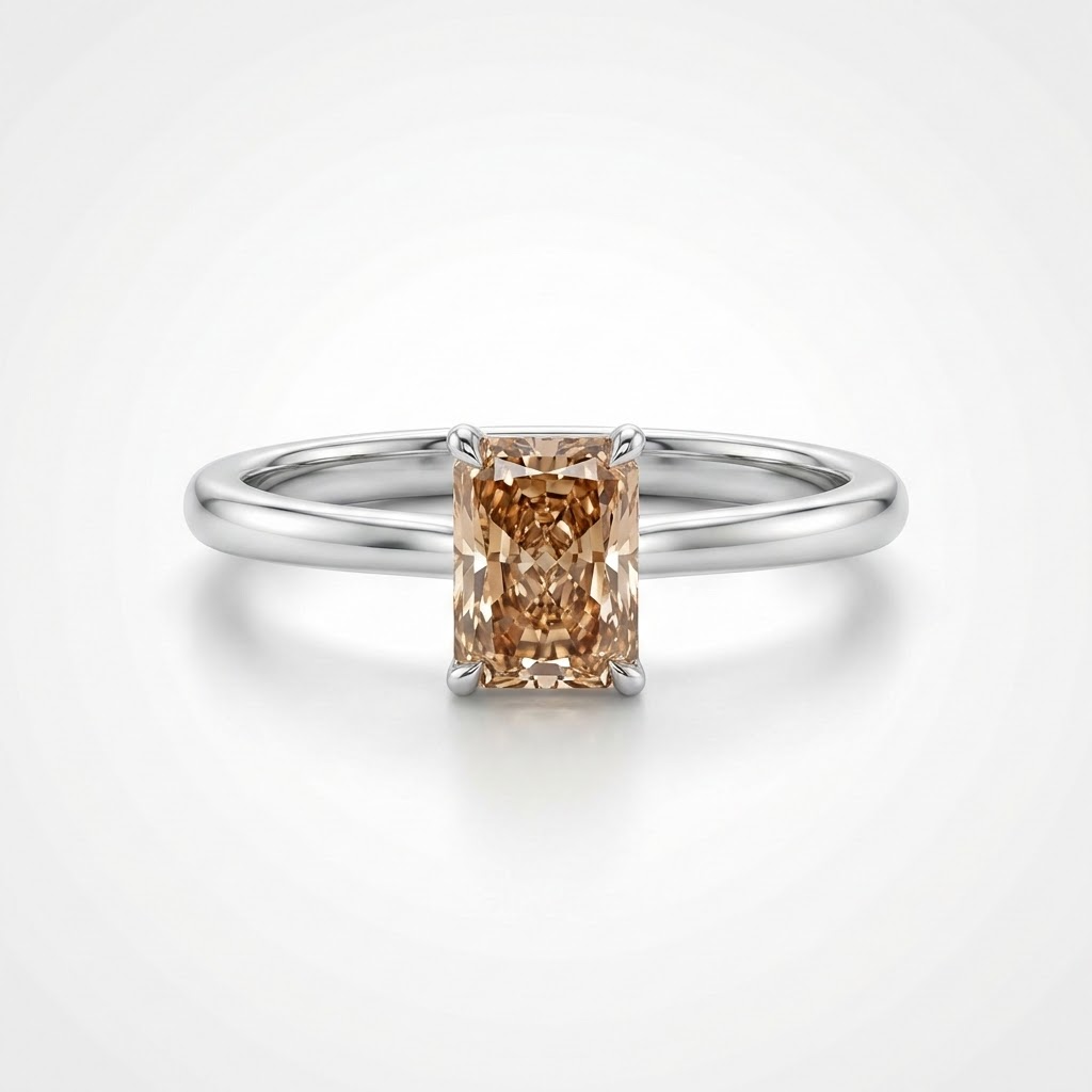 Ring with a brown diamond in a silver setting on a light gray background::Radiant|White Gold