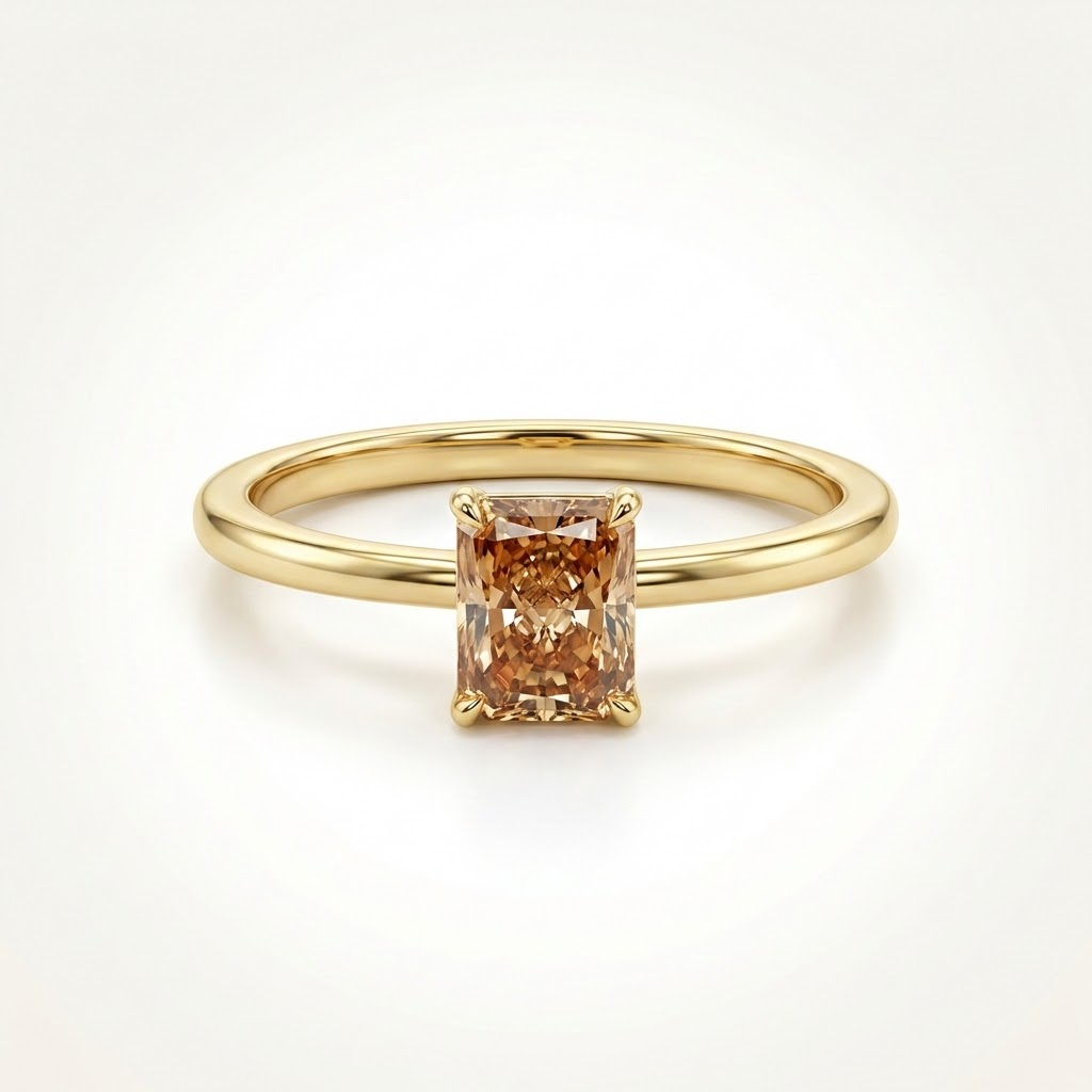 Gold ring with a brown gemstone on a white background::Radiant|Yellow Gold
